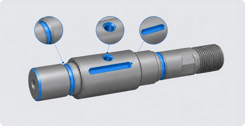 Shaft with magnified views of holes and end features